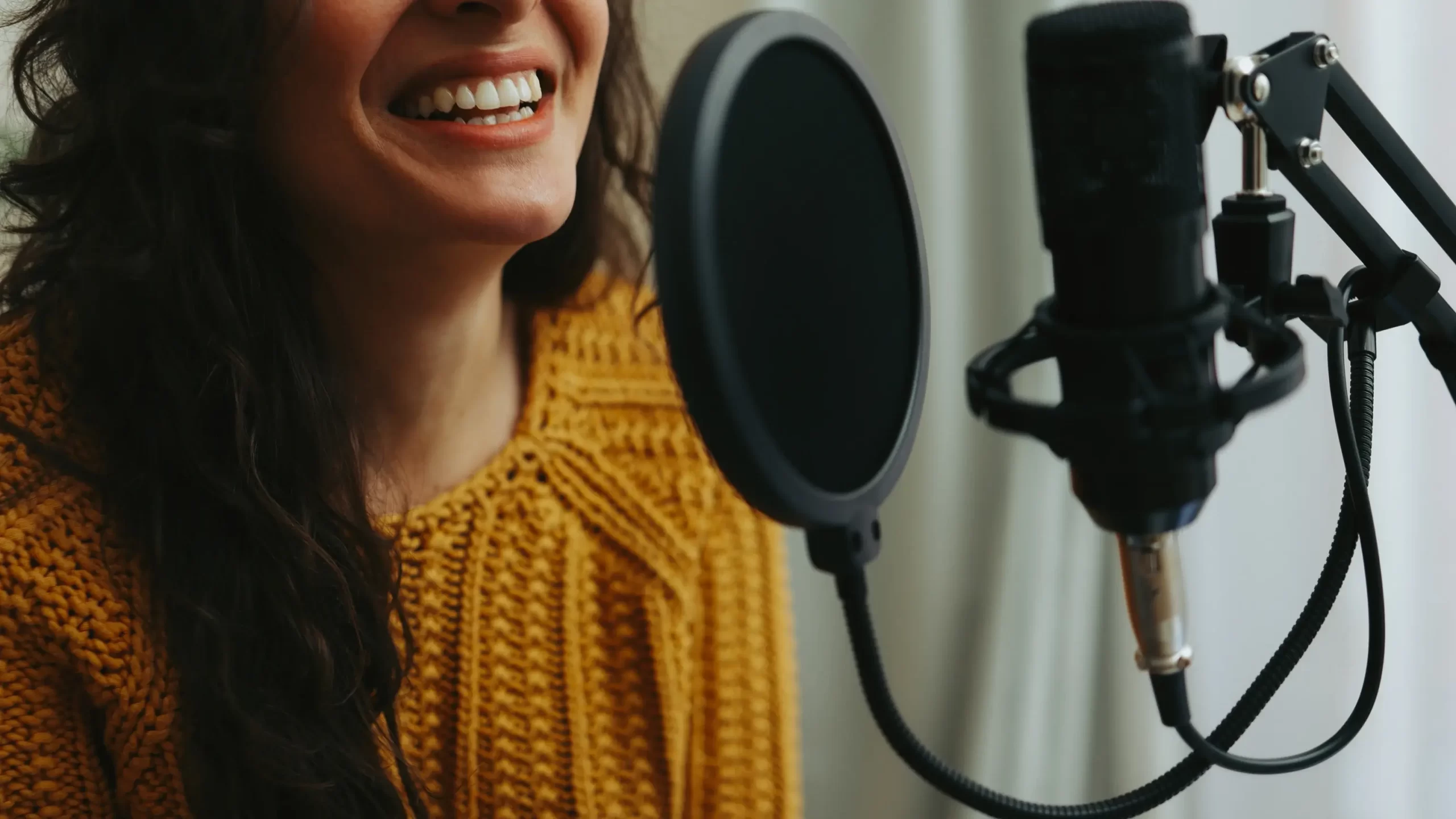 A woman creating a voiceover